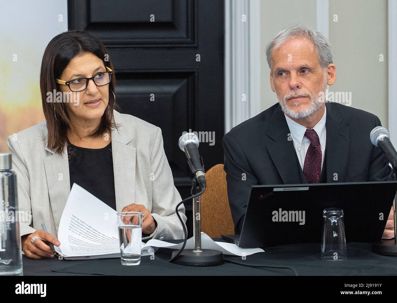 Jacques Ramsay Liberal Coroners Gehane Kamel, left, and Jacques Ramsay read a copy of her ...