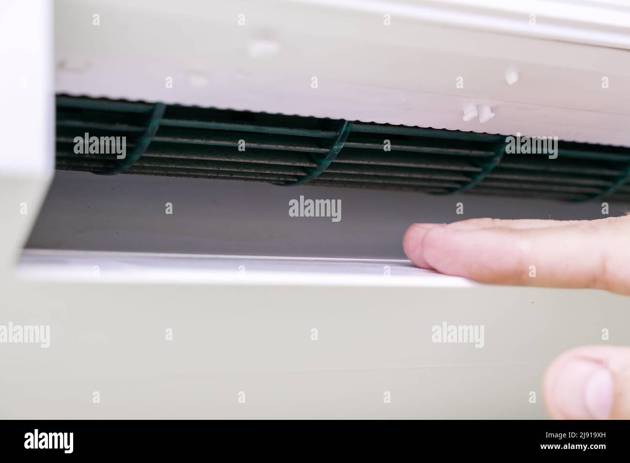 dirty ceiling air conditioner cooler closeup. Stock Photo
