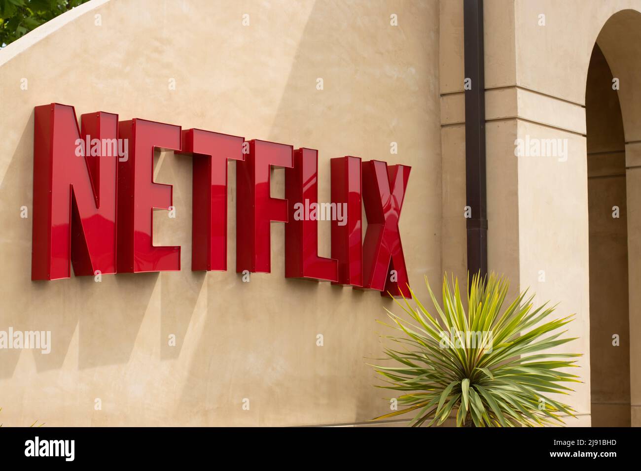 Netflix logo is seen at the main entrance to the Netflix headquarters in Los Gatos, California, on Thursday, May 5, 2022. Stock Photo