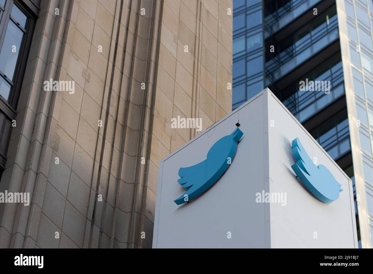 The Twitter logo is seen at its headquarters in San Francisco, California, at dusk, on Sunday, May 1, 2022. Stock Photo