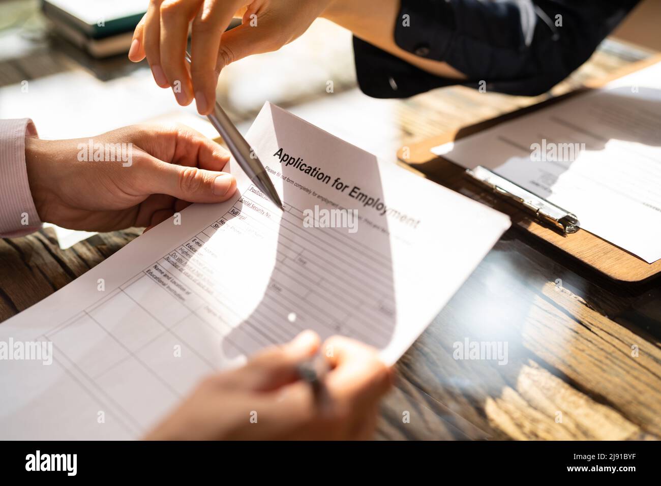 Job Interview And Unemployment. Hire Applicant. Application Form Stock Photo