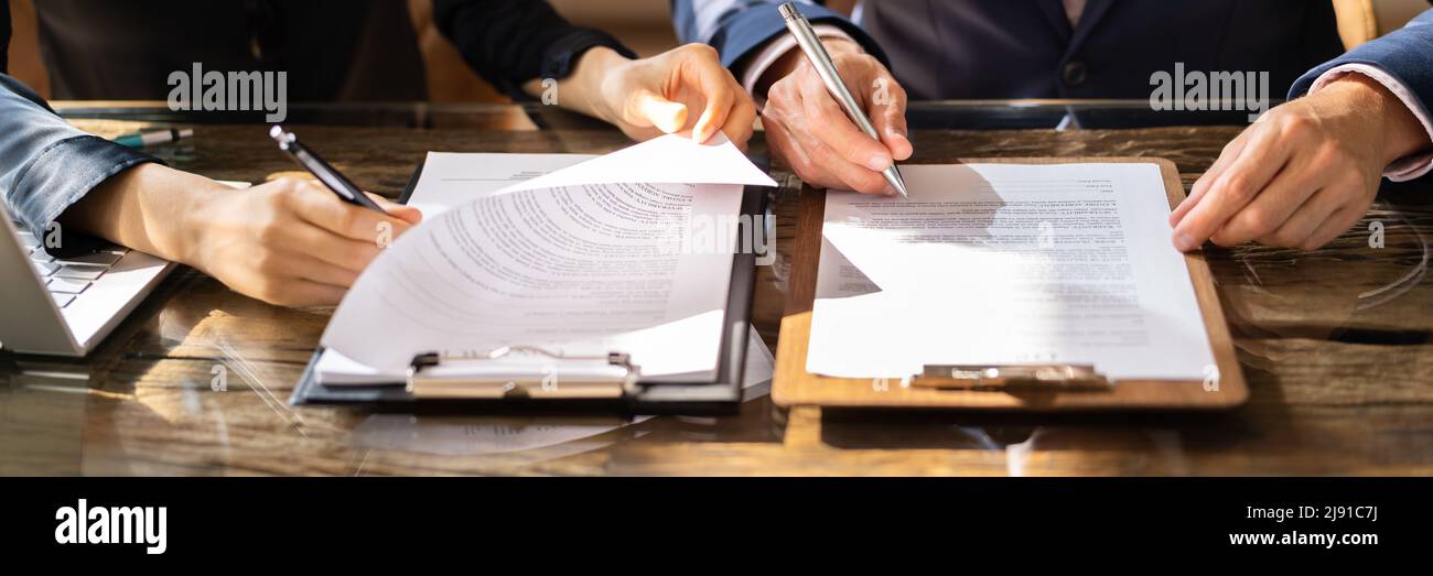 Hand Working Paper Hand close two people working paper hi-res stock photography and images ...