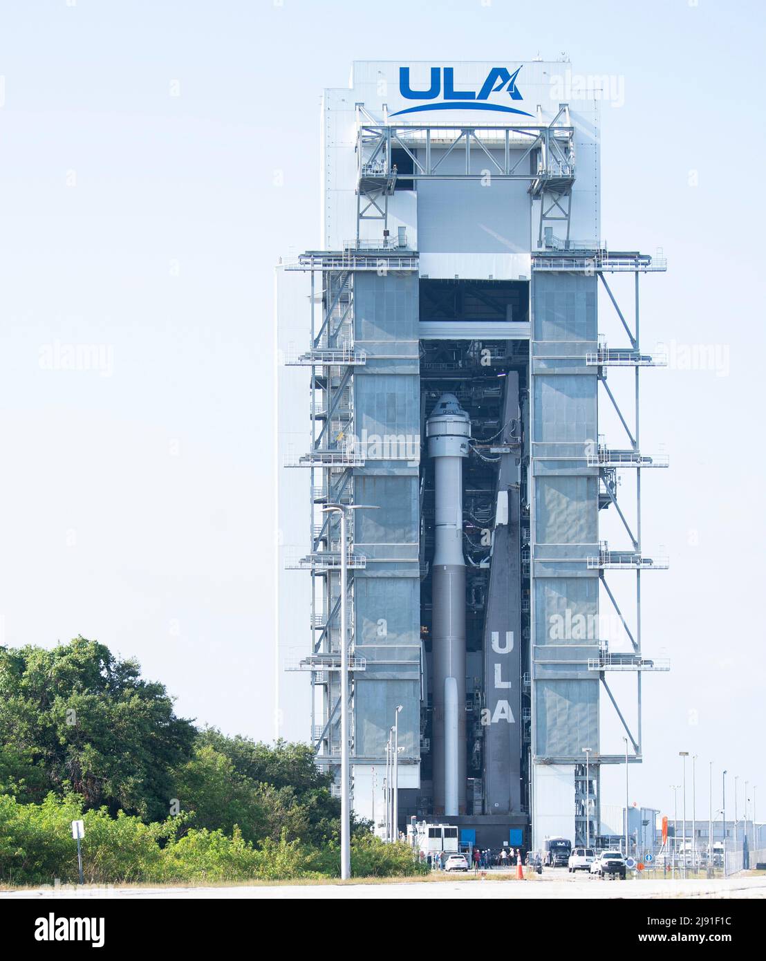 Cape Canaveral, United States of America. 18 May, 2022. The United Launch Alliance Atlas V rocket carrying the Boeing CST-100 Starliner spacecraft aboard begins to roll out from the Vertical Integration Facility at Space Launch Complex 41 in preparation for launch, May 18, 2022 in Cape Canaveral, Florida. The Orbital Flight Test-2 will be second un-crewed flight test and will dock to the International Space Station and is expected to lift off May 19th. Credit: Joel Kowsky/NASA/Alamy Live News Stock Photo