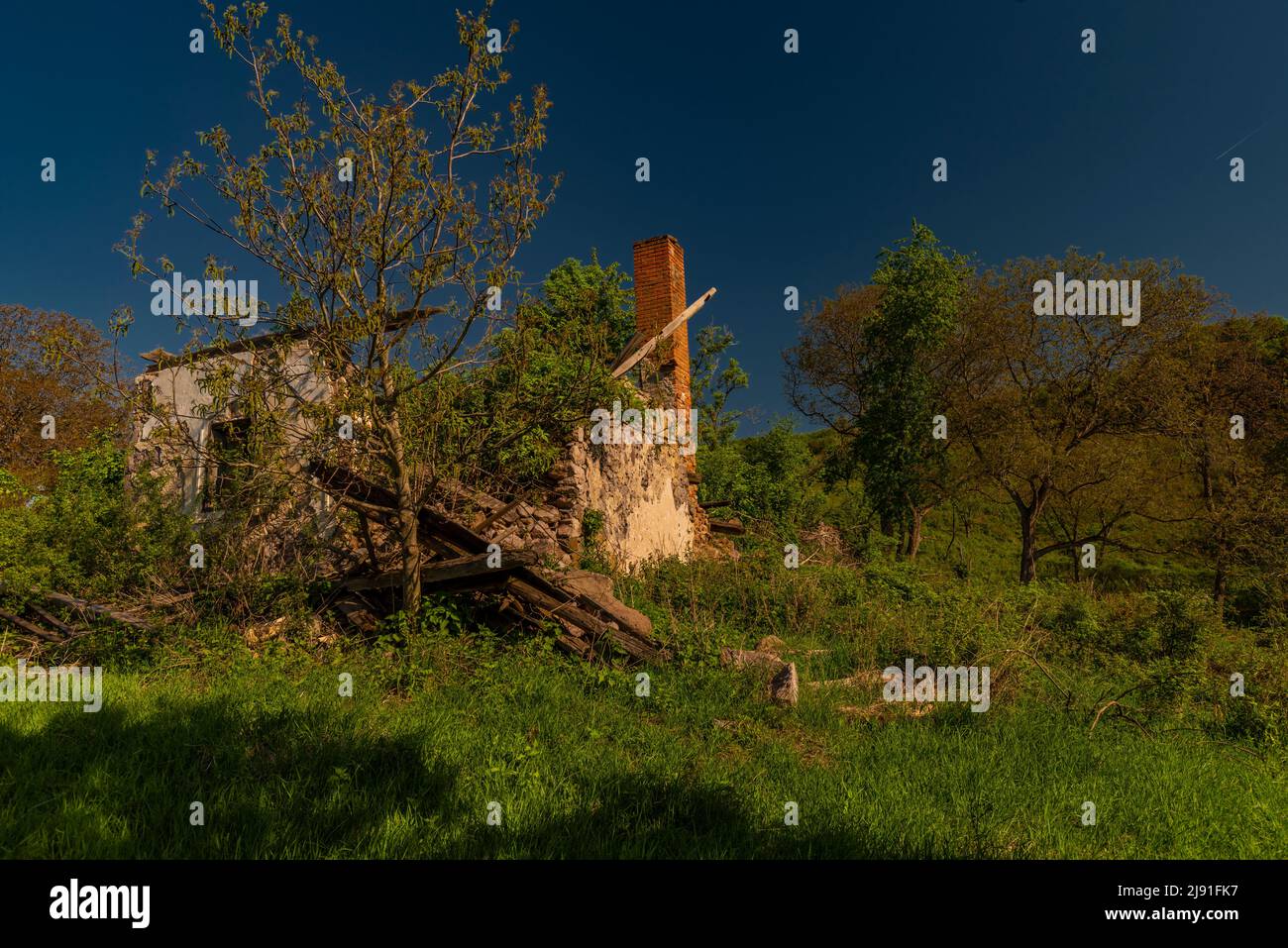 Landscape in Slovakia in sping fresh morning with vanished village and ruin house Stock Photo