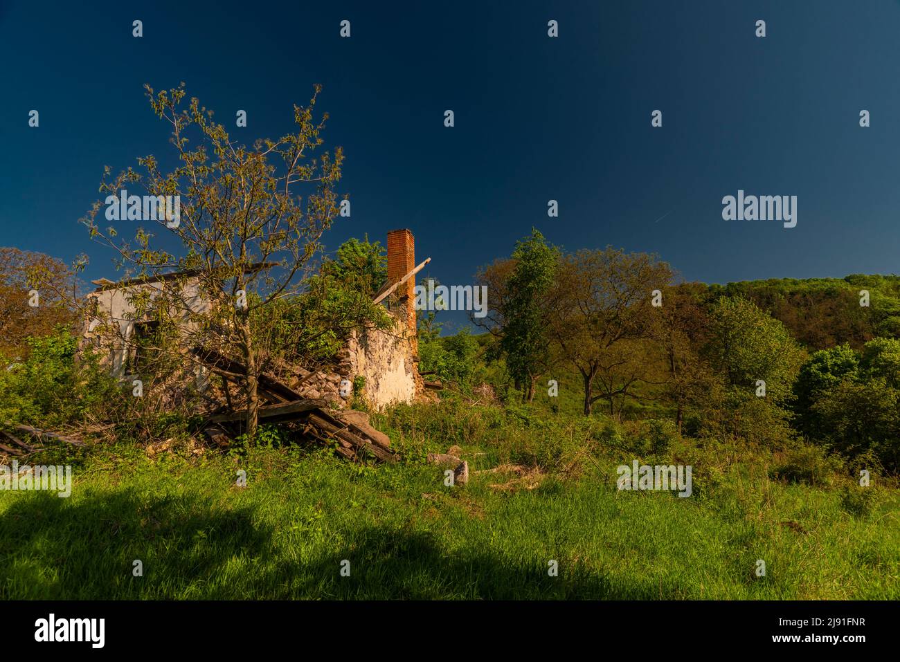 Landscape in Slovakia in sping fresh morning with vanished village and ruin house Stock Photo