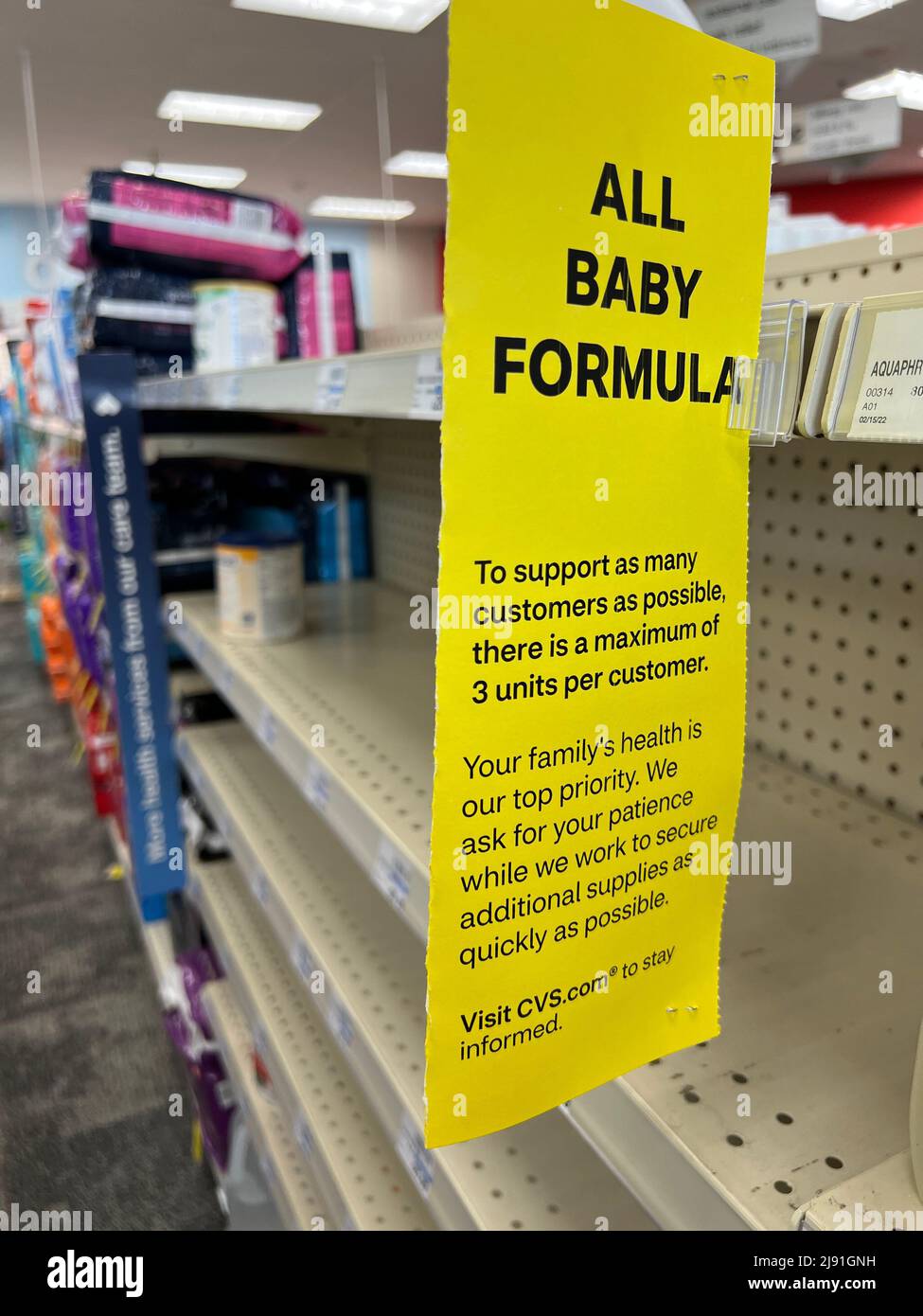 Empty shelves at a CVS store in suburban Chicago show how widespread the baby formula shortage is. Customers are limited to how much they can purchase Stock Photo