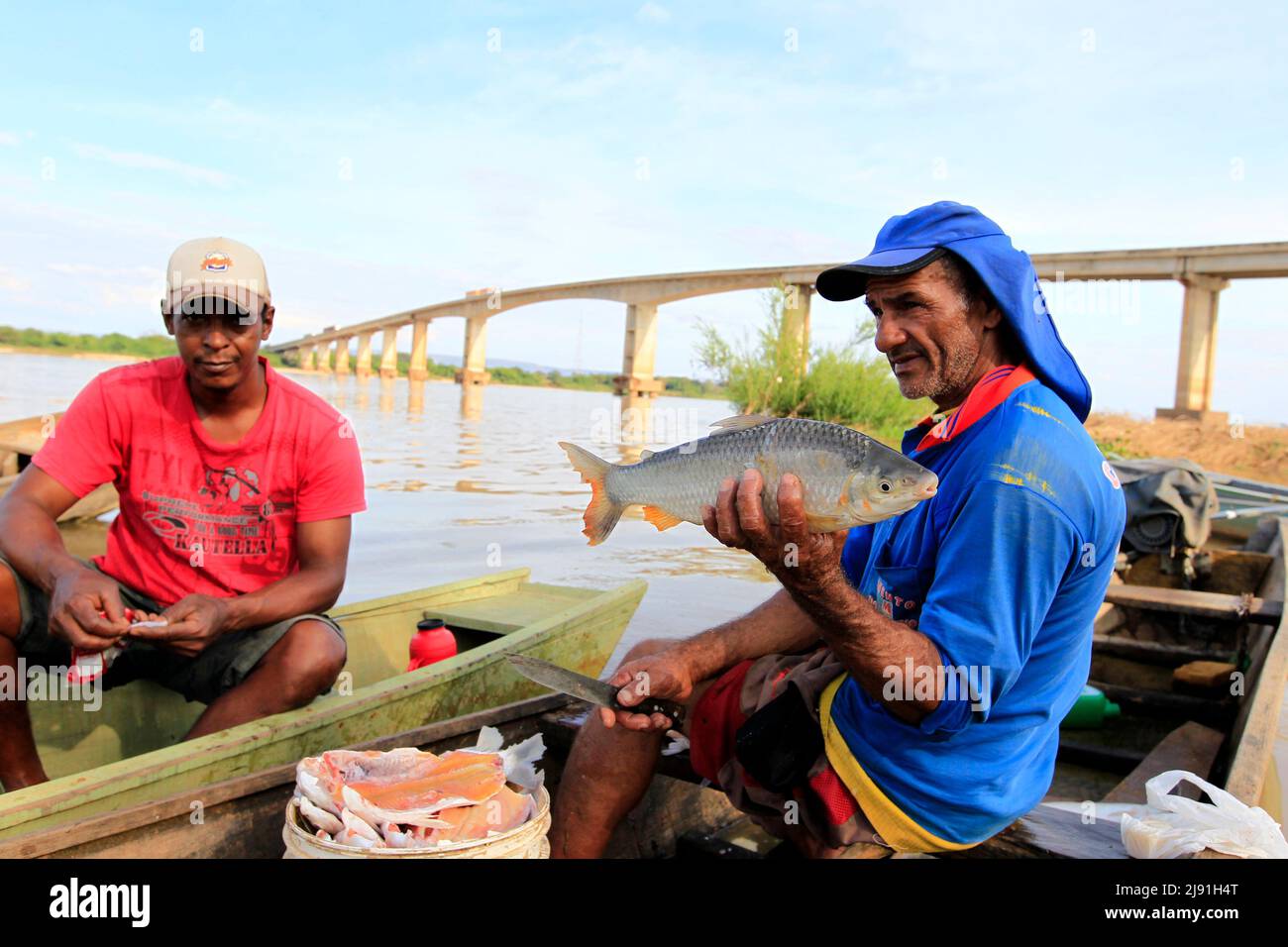 ibotirama, bahia, brazil - may 18, 2022: fishermen on a boat on the Sao Francisco river in the city of Ibotirama, in western Bahia. Stock Photo