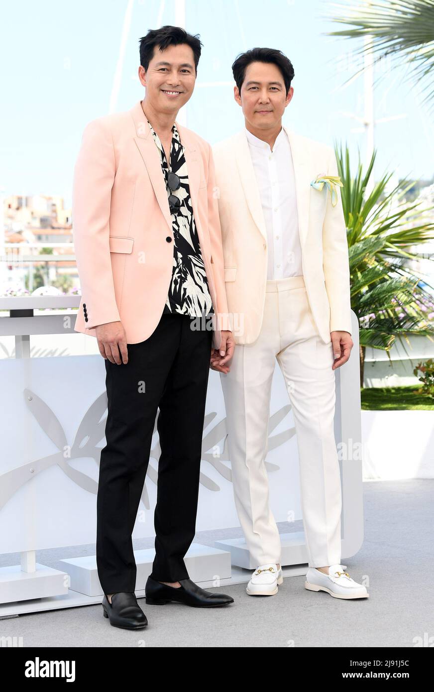 Cannes, France. 19th May, 2022. South Korean actors Jung Woo-Sung and Lee Jung-Jae attend the photo call for The Hunt at Palais des Festivals at the 75th Cannes Film Festival, France on Thursday, May 19, 2022. Photo by Rune Hellestad/ Credit: UPI/Alamy Live News Stock Photo
