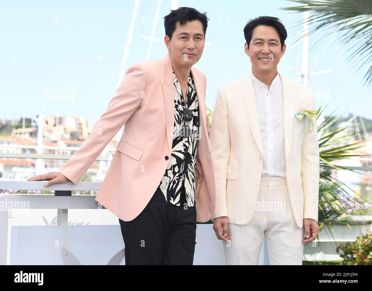Cannes, France. 19th May, 2022. South Korean actors Jung Woo-Sung and Lee Jung-Jae attend the photo call for The Hunt at Palais des Festivals at the 75th Cannes Film Festival, France on Thursday, May 19, 2022. Photo by Rune Hellestad/ Credit: UPI/Alamy Live News Stock Photo