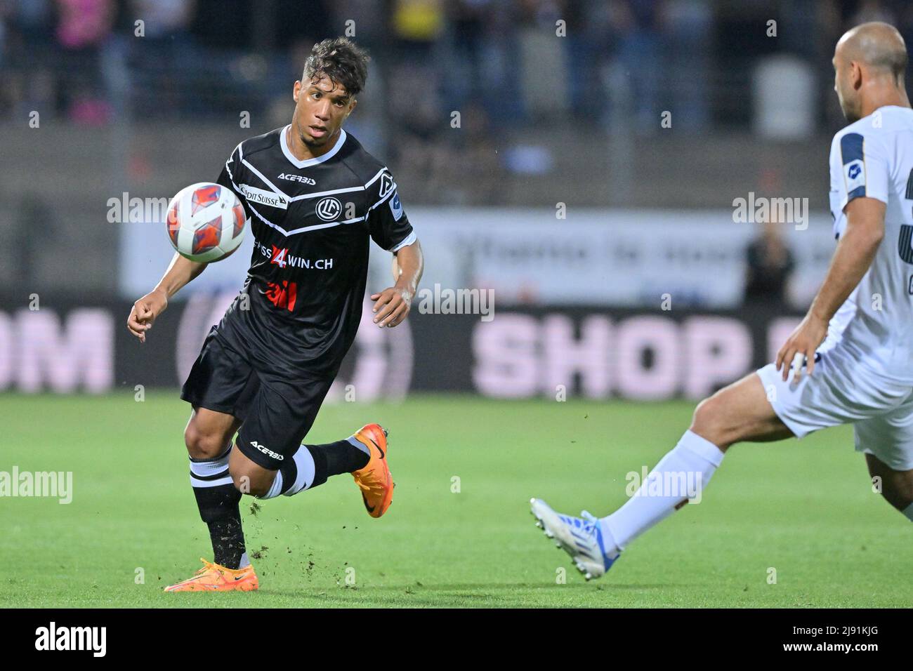 Lugano, Switzerland. 25th July, 2021. Antonio Marchesano (#10 FC Zuerich)  and Sandi Lovric (#24 FC Lugano) during the Super League match between FC  Lugano and FC Zuerich at Cornaredo Stadium in Lugano