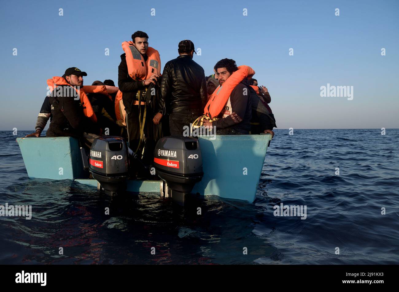 Italy. 18th May, 2022. Migrants waiting to be helped on a boat. The ...