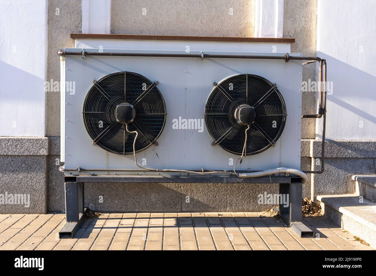 air conditioning unit on the facade of the building refrigeration fans Stock Photo