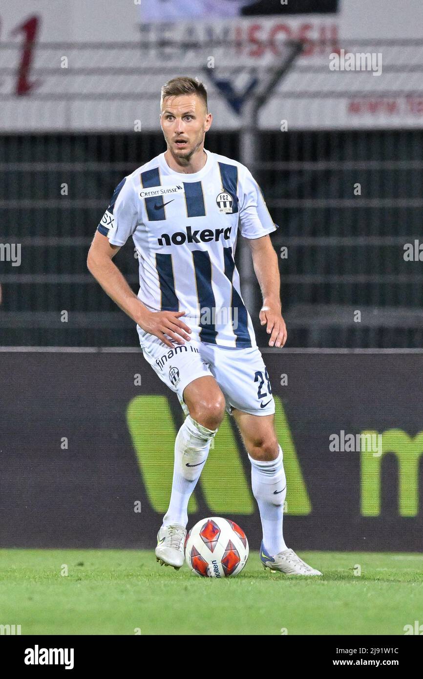 Lugano, Switzerland. 25th July, 2021. Mikael Facchinetti (#7 FC Lugano) and  Nikola Boranijasevic (#19 FC Zuerich) during the Super League match between FC  Lugano and FC Zuerich at Cornaredo Stadium in Lugano