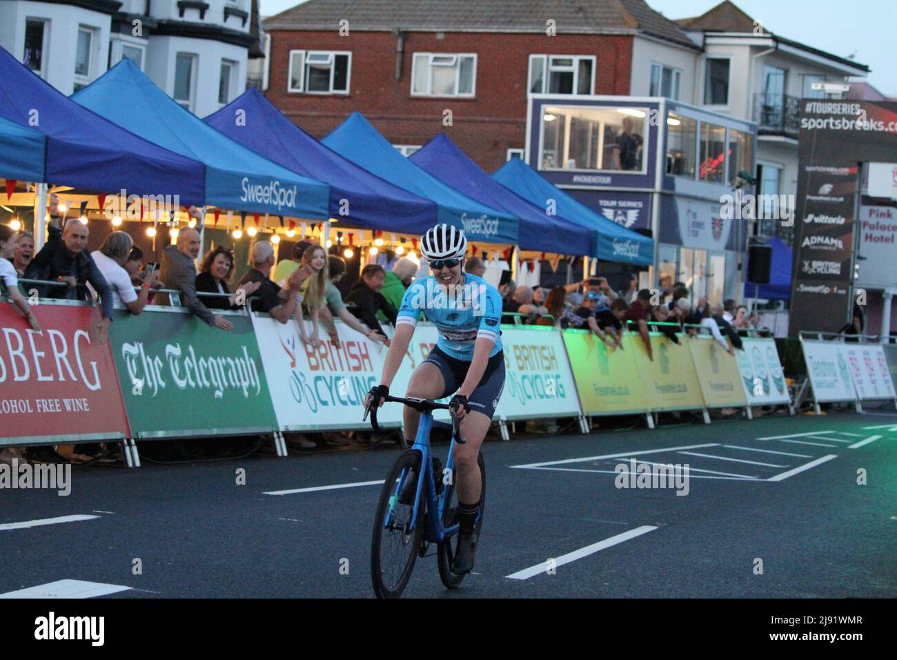 Clacton-on-Sea, UK. 19th May 2022. Cycling event Tour Series 2022 round 5 at Clacton-on-sea, Essex. Sammie Stuart of team Brother UK – LDN  wins round 5 of the women's race. She also clocked the fastest lap time. The Tour Series is Britain's leading circuit race series, with each round comprising of a race lasting one hour plus an additional five laps.  The winners are those with the most points accumulated over the rounds. Credit: Eastern Views/Alamy Live News Stock Photo