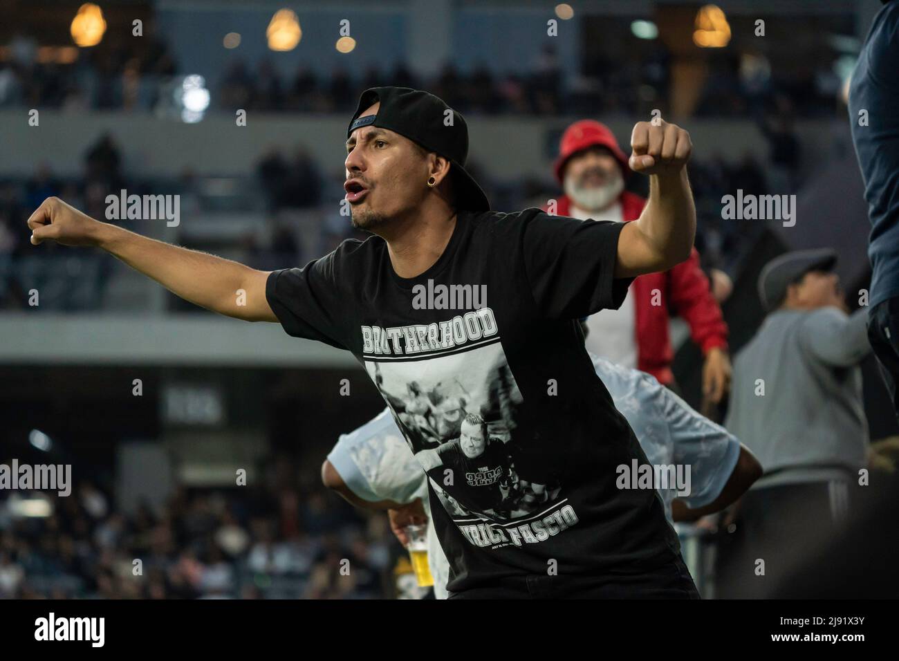 A LAFC fan chants during a MLS match against the Austin FC, Wednesday, May 18, 2022, at the Banc of California Stadium, in Los Angeles, CA. Austin FC Stock Photo