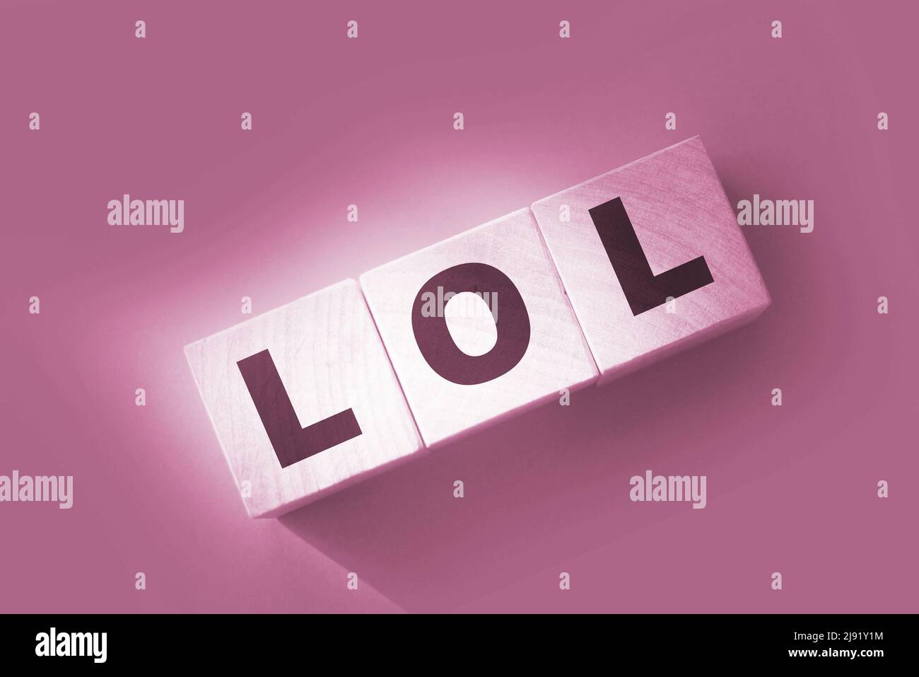 A Pretty Young Teen Happily Holding Rustic Alphabet Blocks With Her  Text-message Abbreviation: LOL (meaning Laughing Out Loud). On A White  Background. Stock Photo, Picture and Royalty Free Image. Image 26610107.