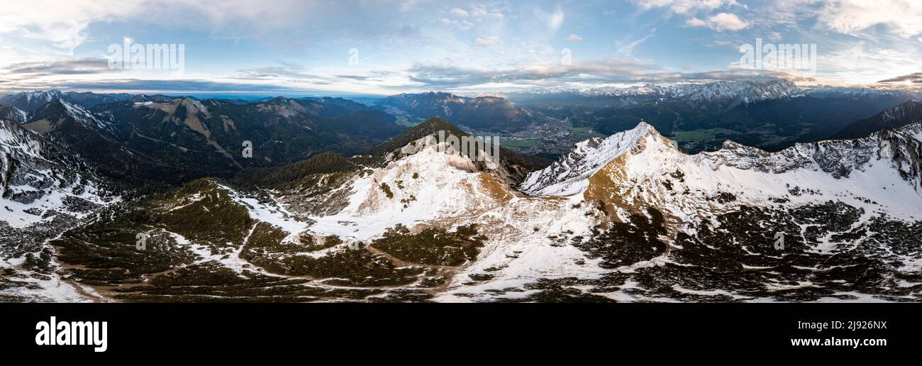 Alpine panorama with Zugspitze, aerial view, mountains with snow in the evening, summit of Kramer, Garmisch, Bavaria, Germany Stock Photo