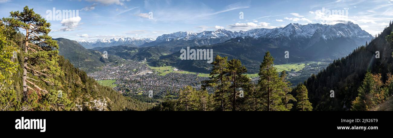 Alpine panorama, view over Garmisch-Partenkirchen and Wetterstein mountains with Zugspitze, Bavaria, Germany Stock Photo