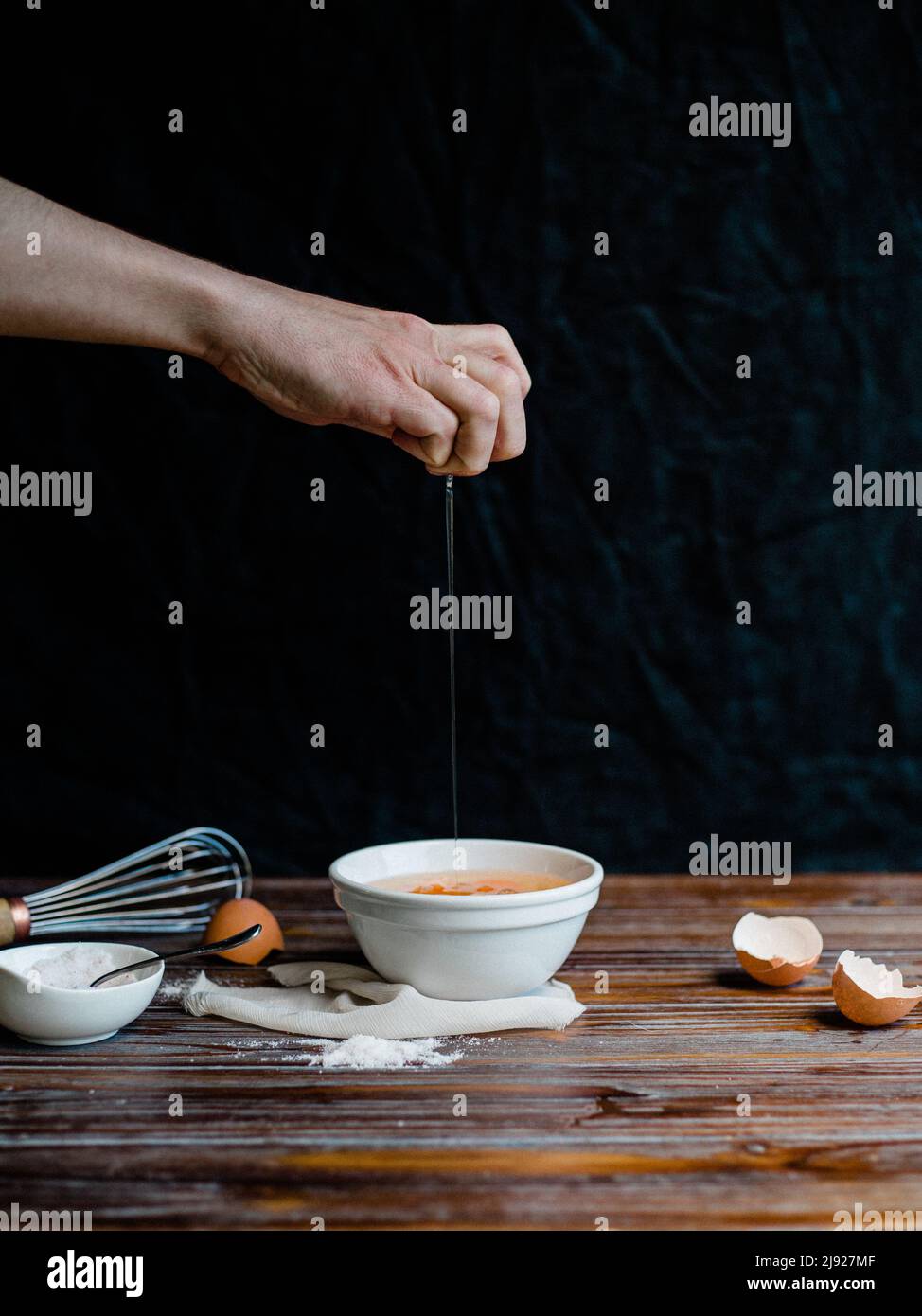 Pear tart on a gray marble background with cinnamon and almond Stock Photo