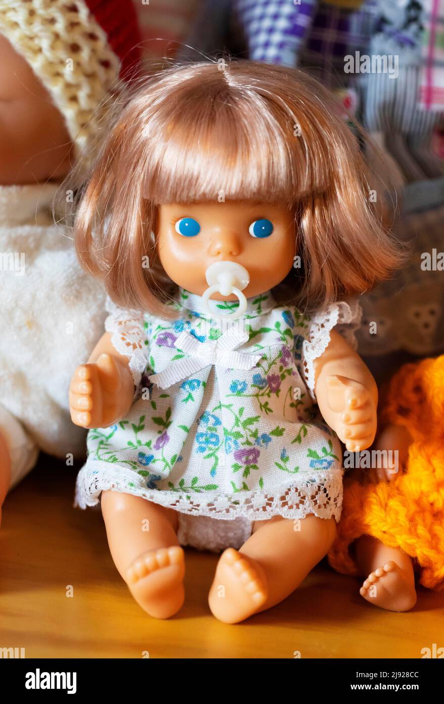 Portrait of an old decorative baby doll, children's toy, symbolic image, Austria Stock Photo