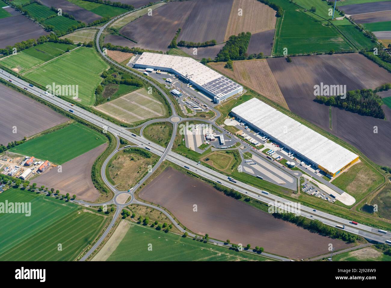 Aerial view of logistics halls on the A1 motorway, Elsdorf exit, transport links, Lower Saxony, Germany Stock Photo