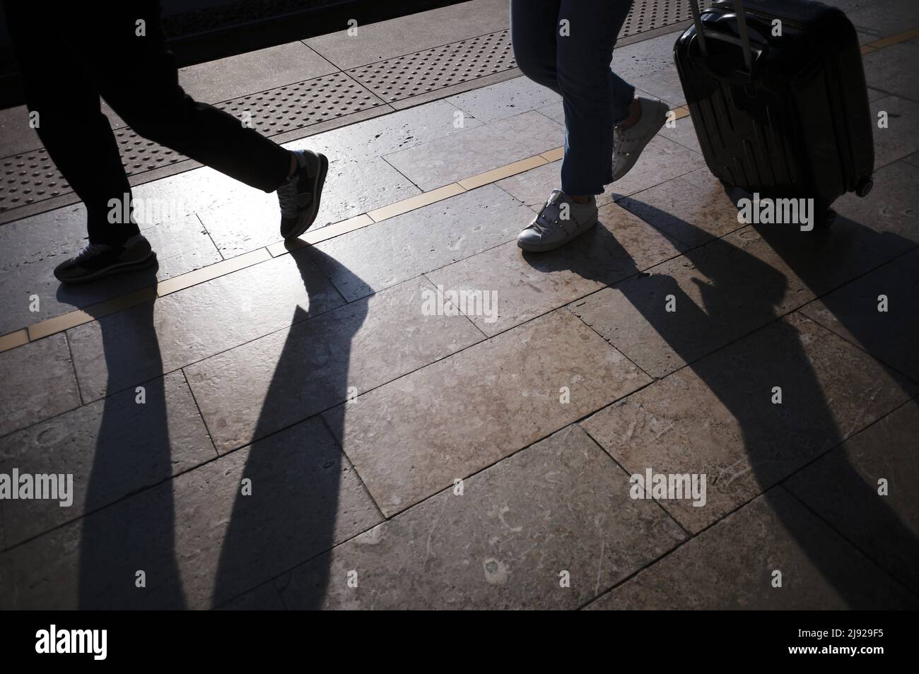 Passengers on the platform, silhouette, shadow, hand luggage, suitcase trolley, Gare TGV, Aix-en-Provence, Bouches-du-Rhone, France Stock Photo