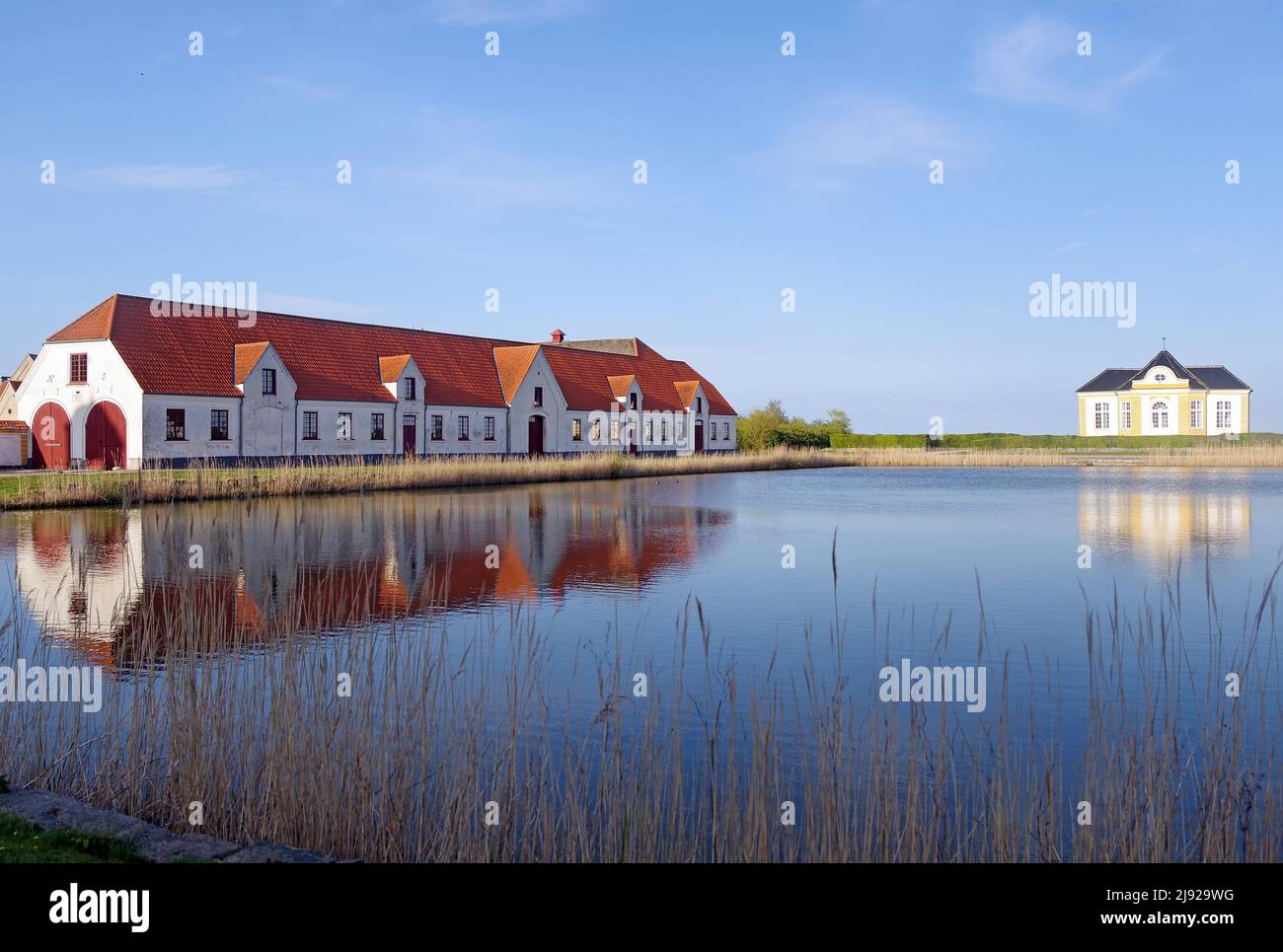 Valdemars Slot, manor and tea house reflected in the evening light, Tasinge, Denmark Stock Photo