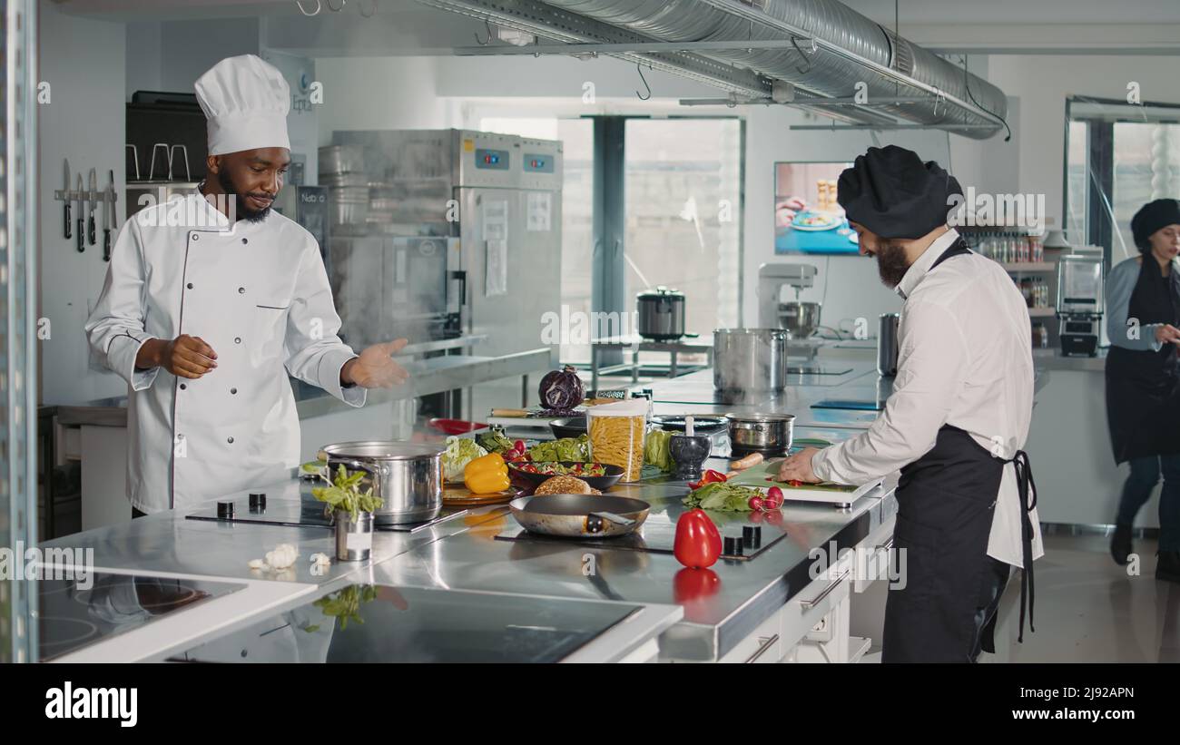 Diverse culinary team recording hi-res stock photography and images - Alamy