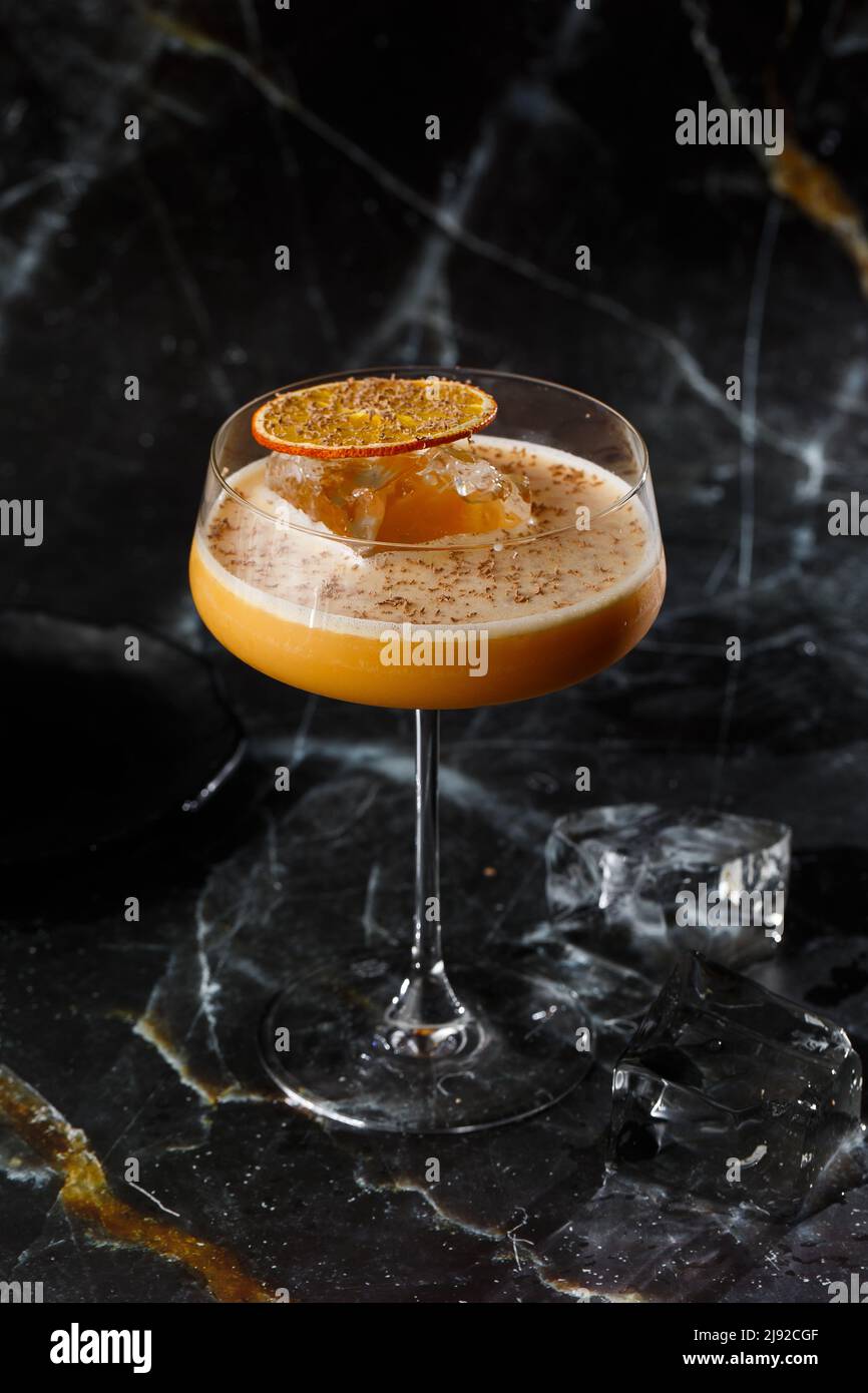 Porto flip - an alcoholic cocktail of the long drink, prepared on the basis of port wine and brandy, a kind of flip. It is classified as a long drink Stock Photo