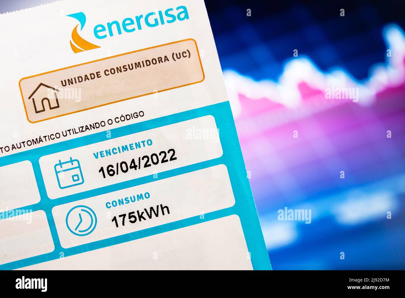 In this photo illustration, an electricity bill indicating the monthly consumption of 175 kilowatts (kWh). Stock Photo