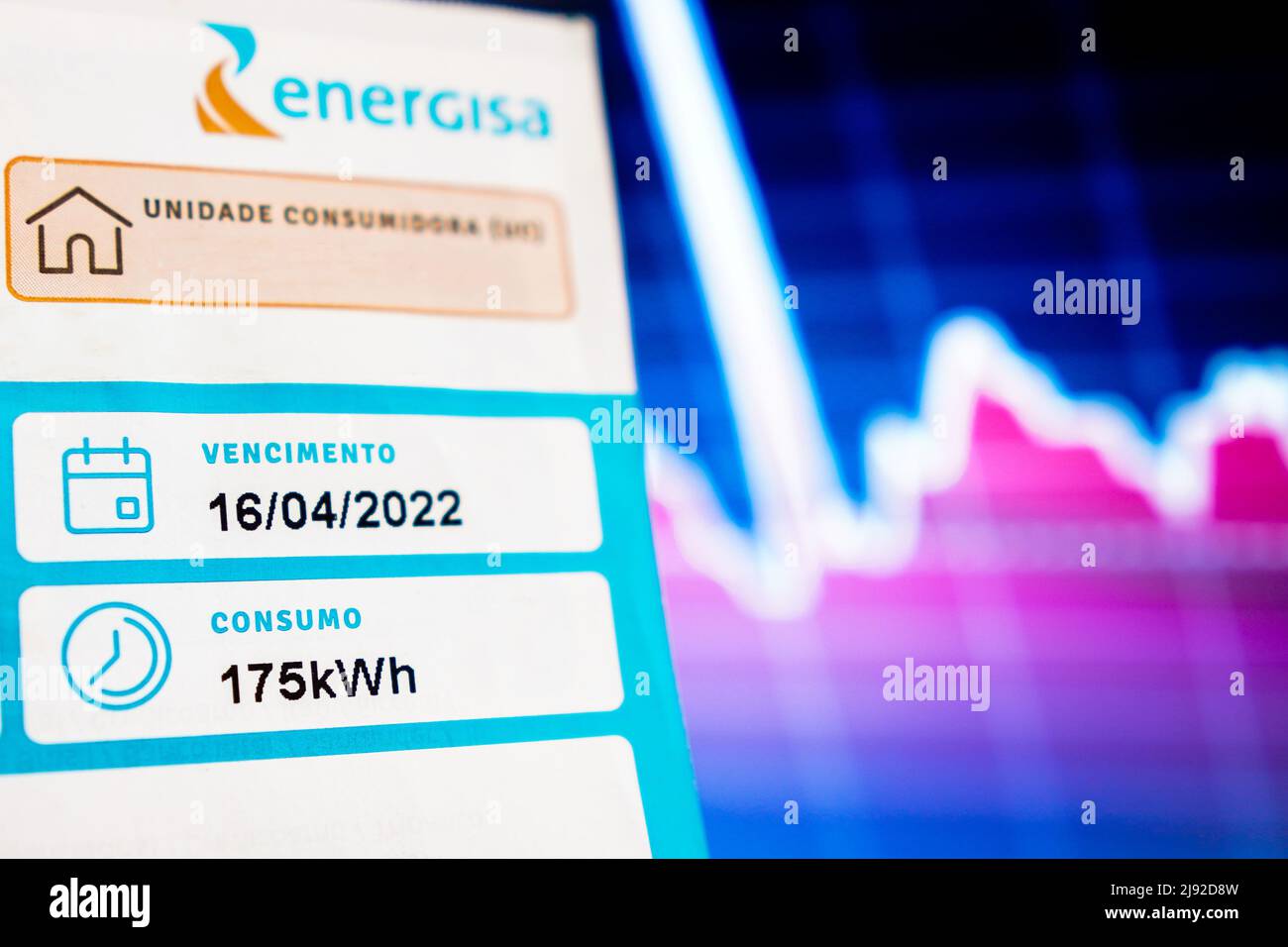 In this photo illustration, an electricity bill indicating the monthly consumption of 175 kilowatts (kWh). Stock Photo