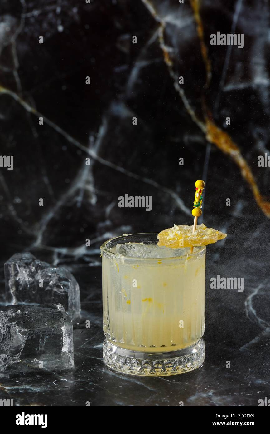 Alcoholic Scotch Whiskey Penicillin Drink Cocktail with Lemon, Honey