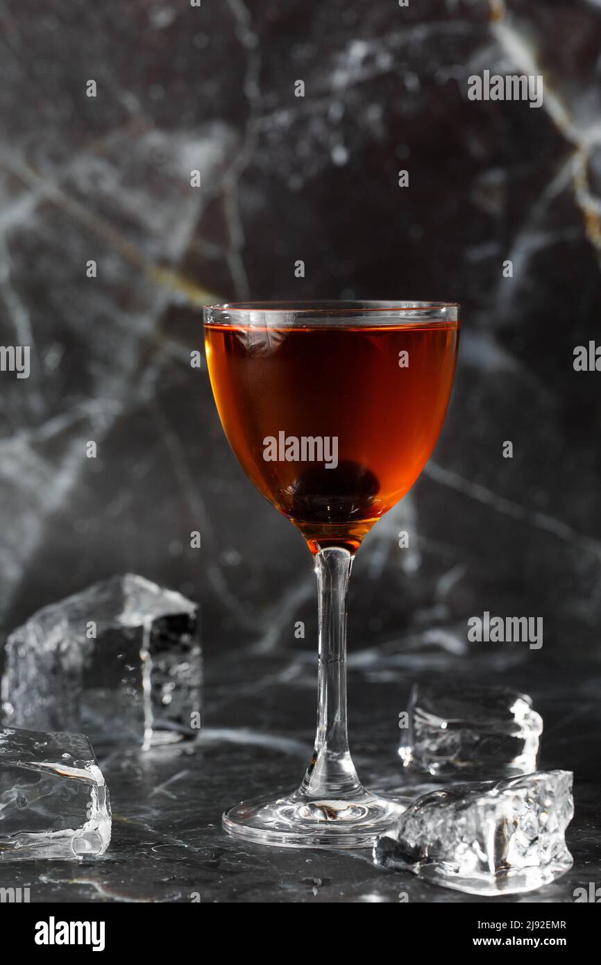 Homemade Rob Roy Cocktail with Scotch and Vermouth. Whiskeybased drinks with cherry. Manhattan