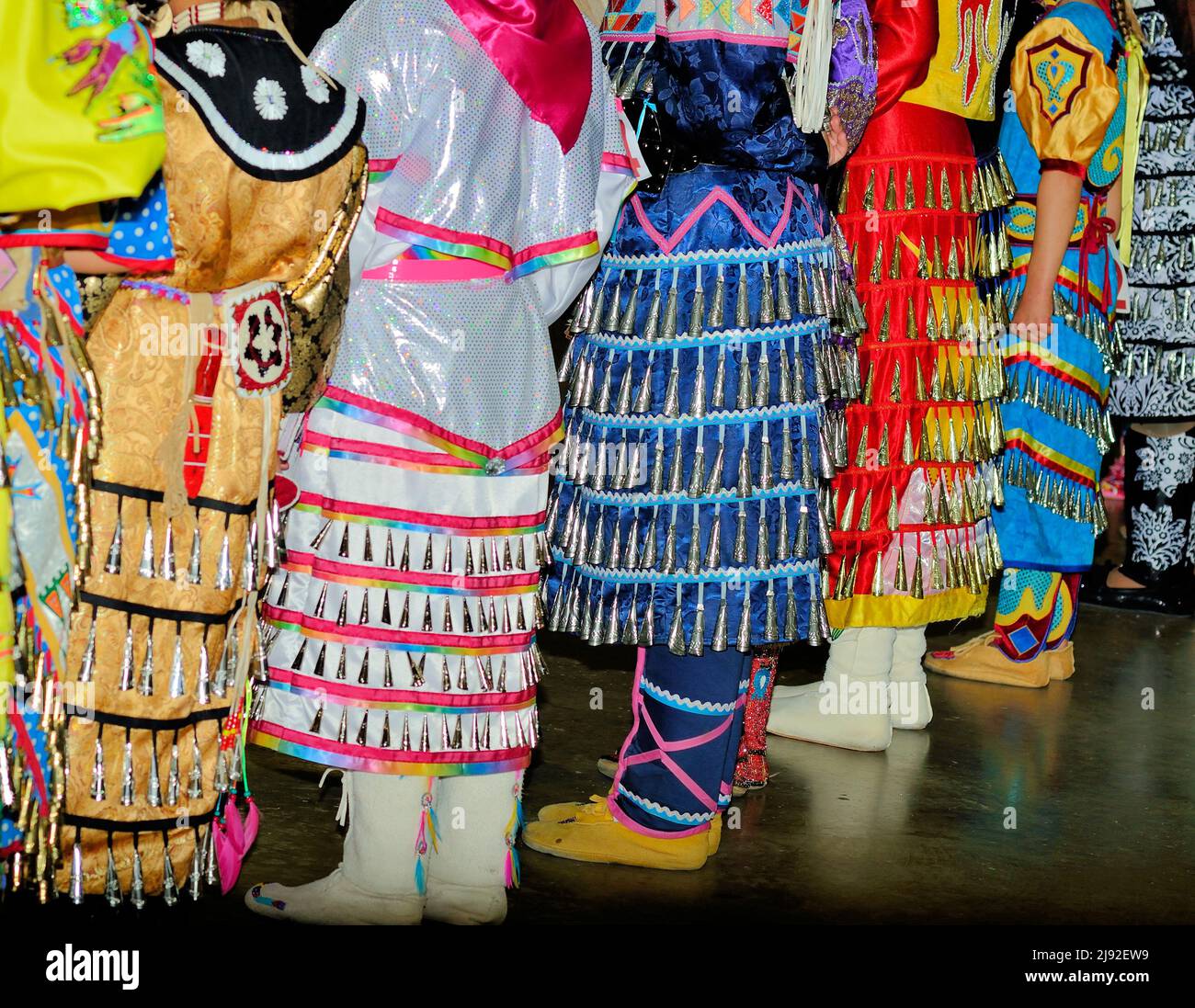 Colorful powwow Jingle dresses and decorative moccasins Stock Photo
