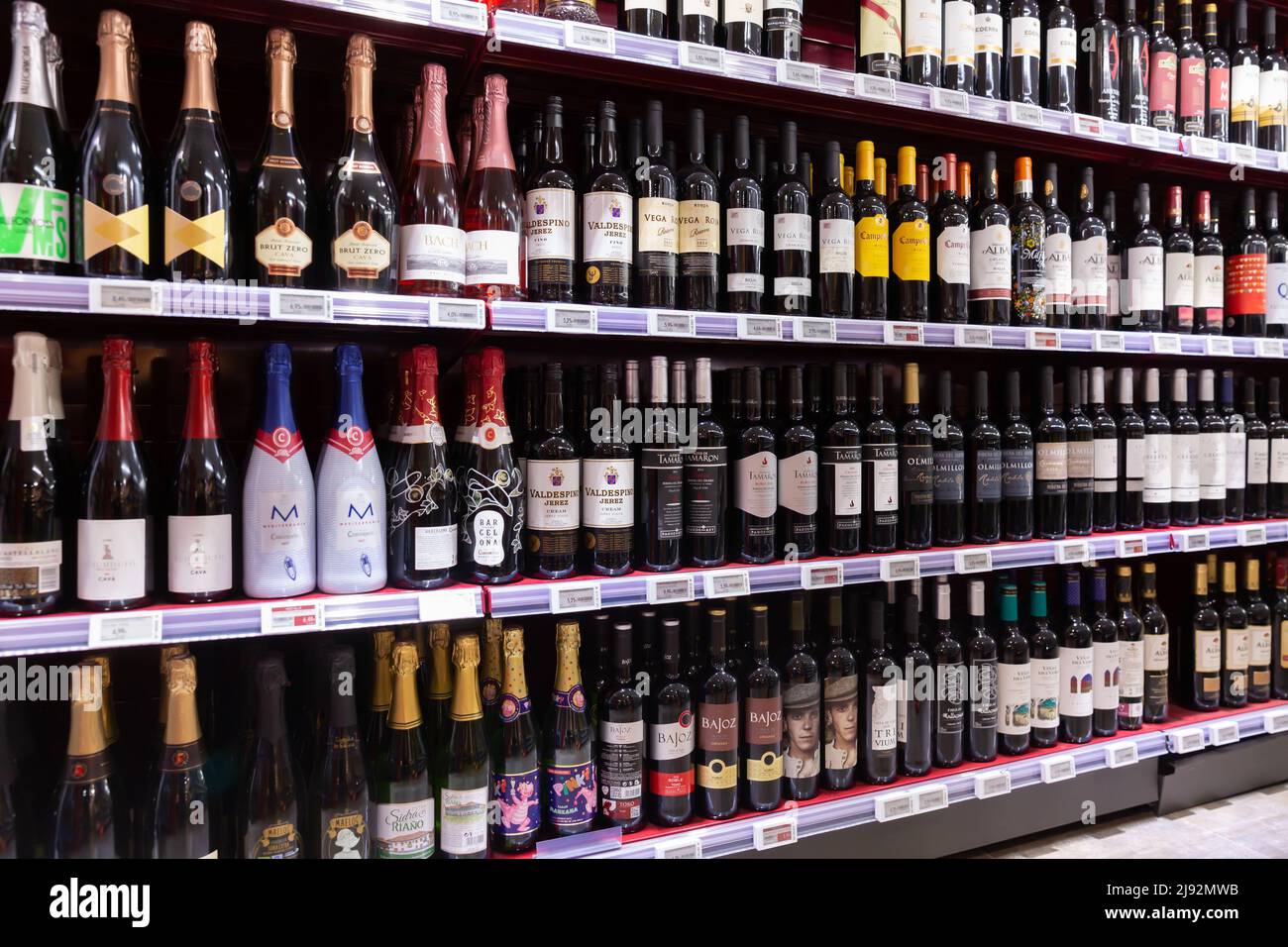 Wine bottles in supermarket Stock Photo Alamy