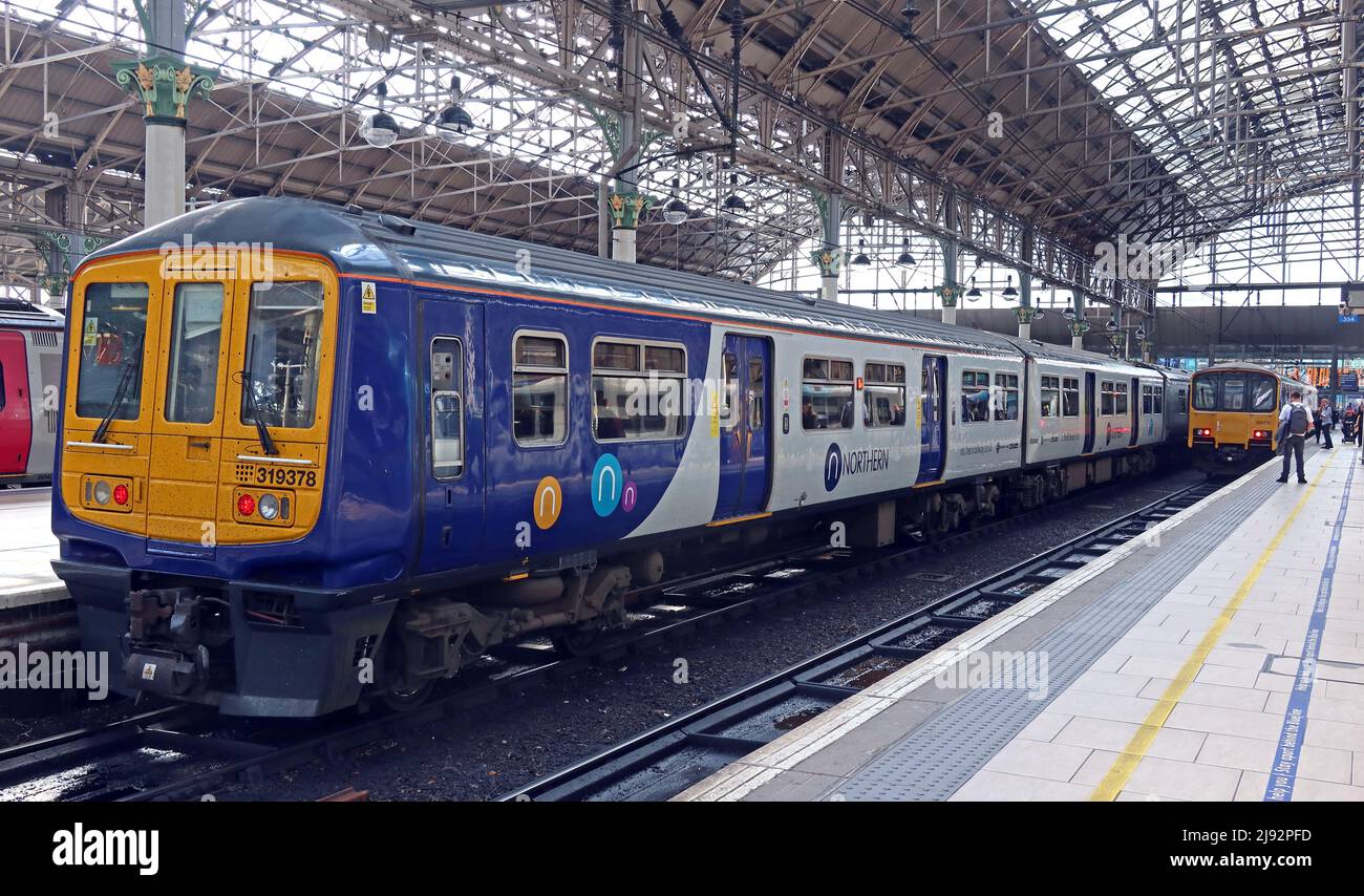 Northern Railway dual-voltage EMU Train 319378 at Piccadilly NPR train station, public transport rail services from Manchester Stock Photo