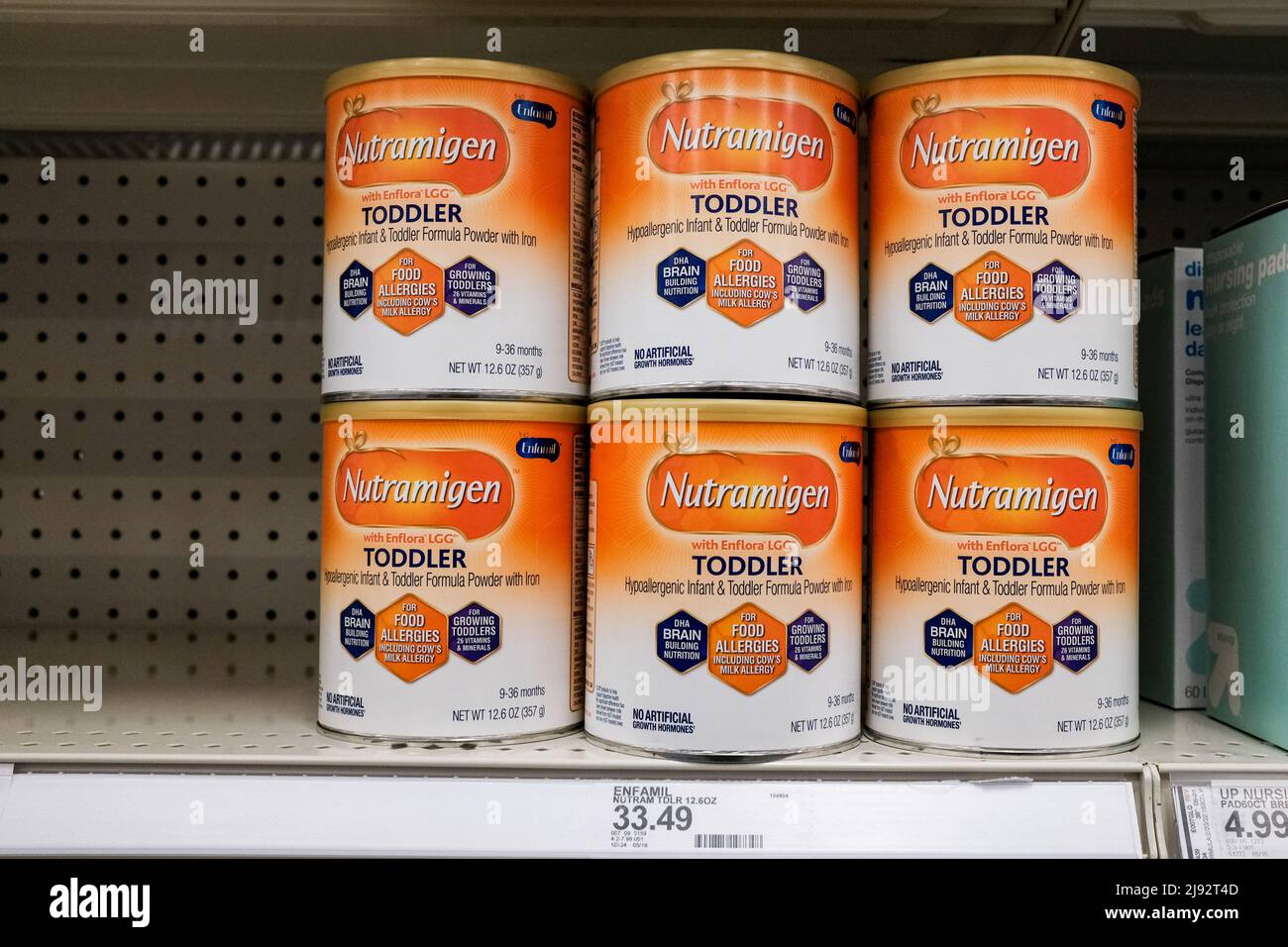 Selinsgrove, United States. 19th May, 2022. A few cans of Enfamil Nutramigen hypoallergenic toddler formula are seen on a shelf in a Target store. Baby formula has been in short supply for months at stores in the United States due to product recalls and supply chain issues. Credit: SOPA Images Limited/Alamy Live News Stock Photo