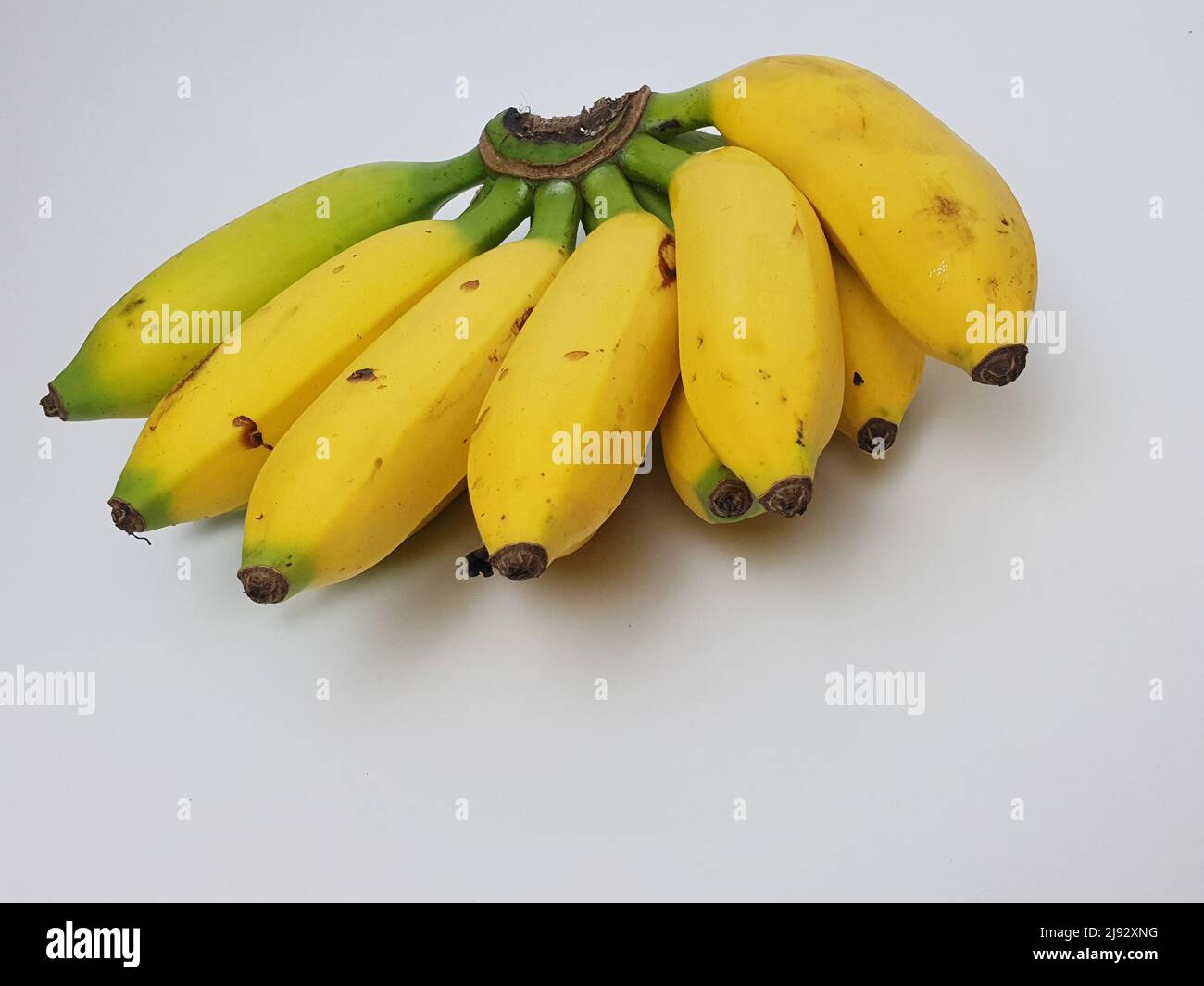 Yellow ripe banana which has many vitamins good for health is on a white background Stock Photo