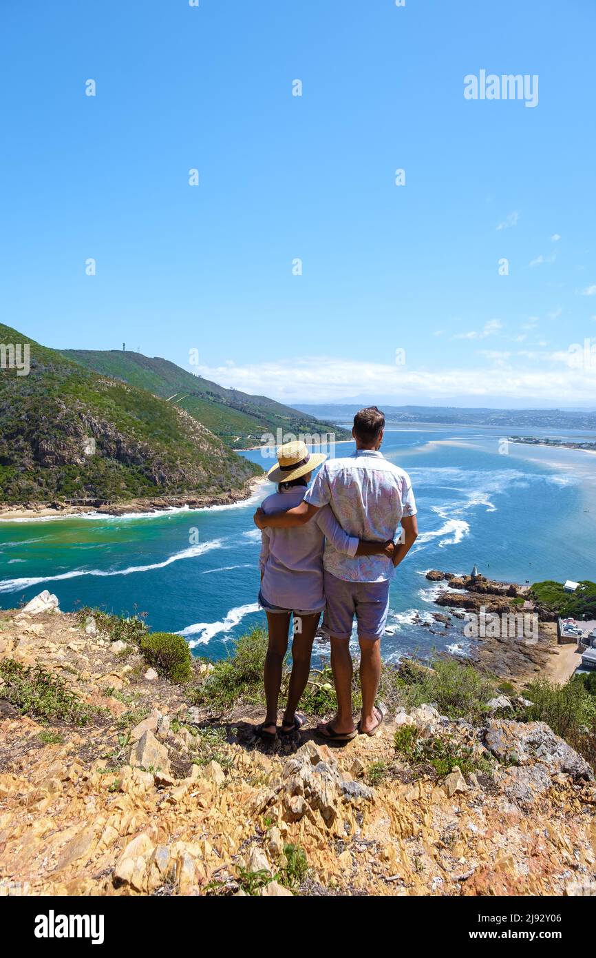 A panoramic view of the lagoon of Knysna, South Africa. beach in Knysna, Western Cape, South Africa. couple man and woman on a trip at the garden route  Stock Photo