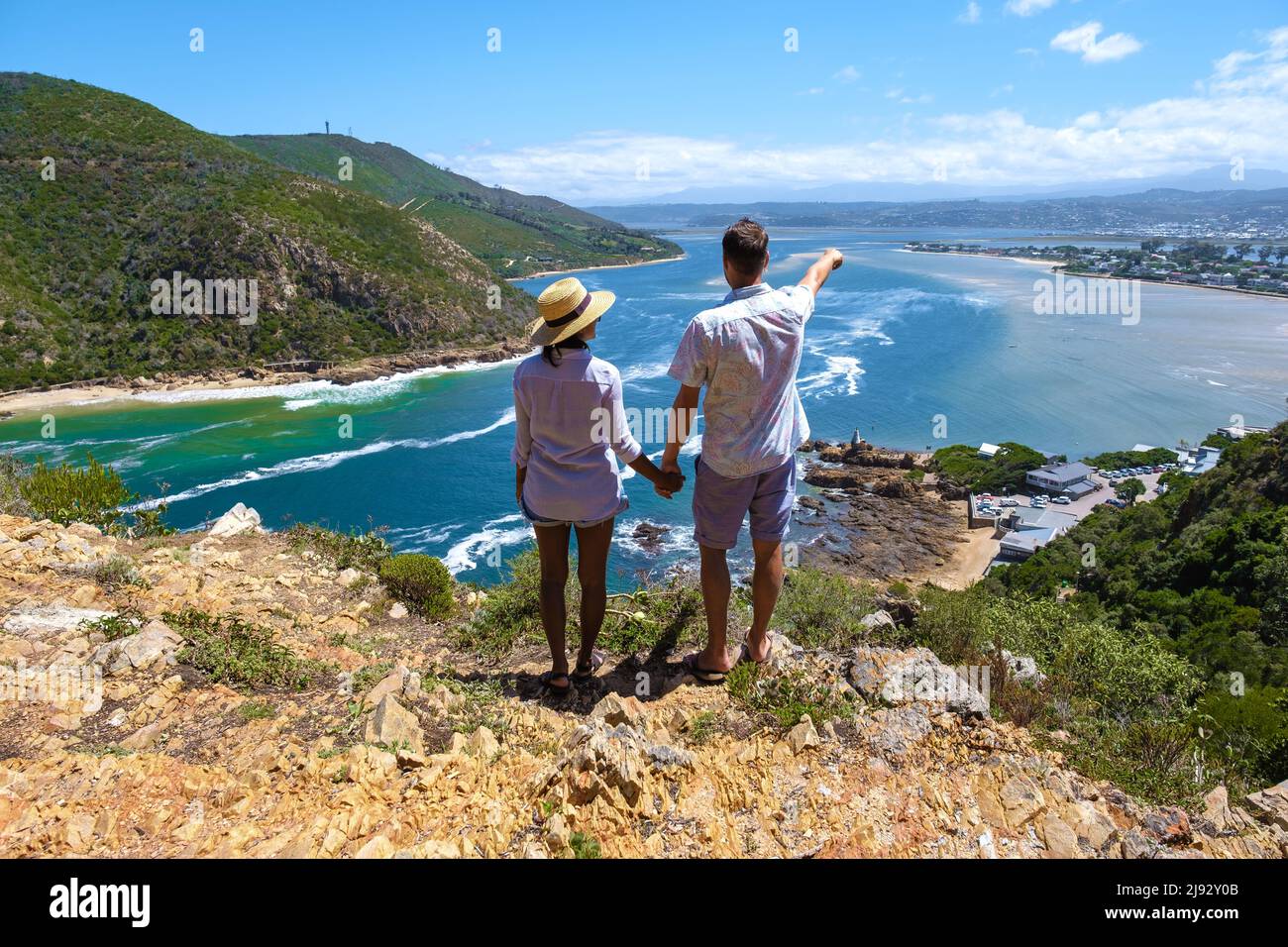 A panoramic view of the lagoon of Knysna, South Africa. beach in Knysna, Western Cape, South Africa. couple man and woman on a trip at the garden route  Stock Photo