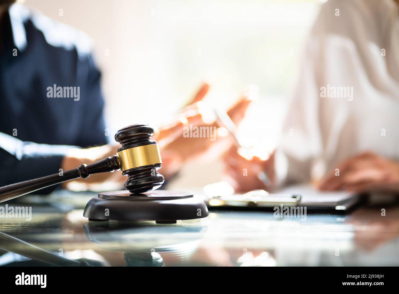 Divorce And Legal Discussion In Law Court. Liability And Justice Stock Photo