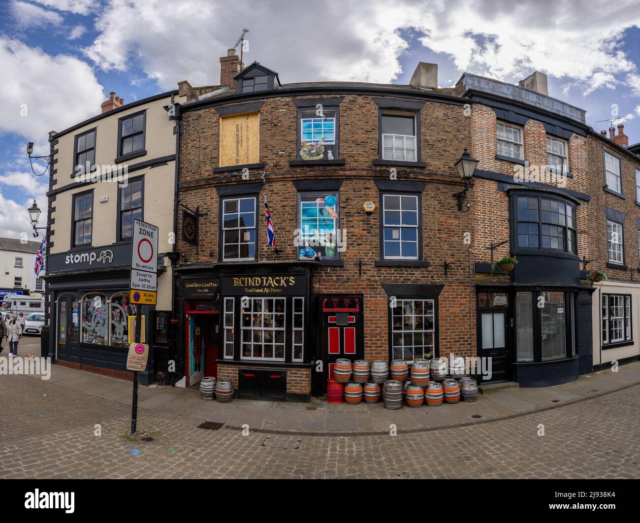 Panorama of Kegs outside Blind Jack's Traditional Ale House in Knaresborough North Yorkshire named after Jack Metcalf the famous road surveyor Stock Photo