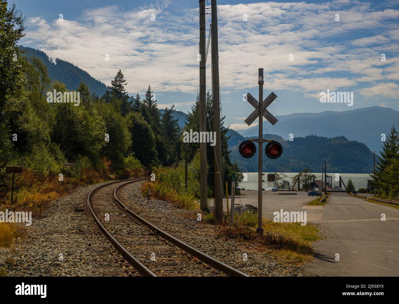 Mountain Railway. Empty road, streetlight sign train road Stock Photo