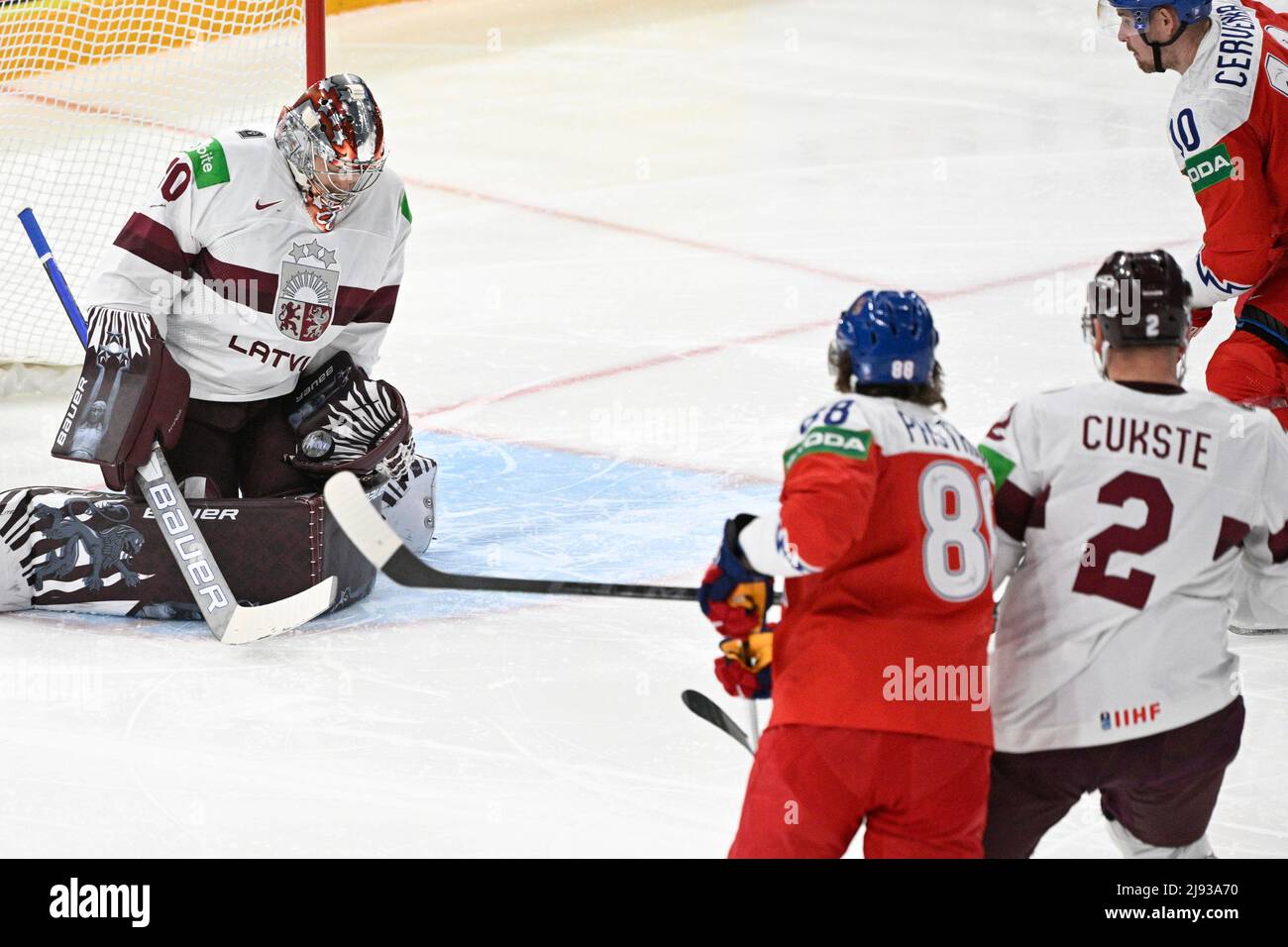 Tampere, Finland. 20th May, 2022. From left Latvia's goalie Elvis