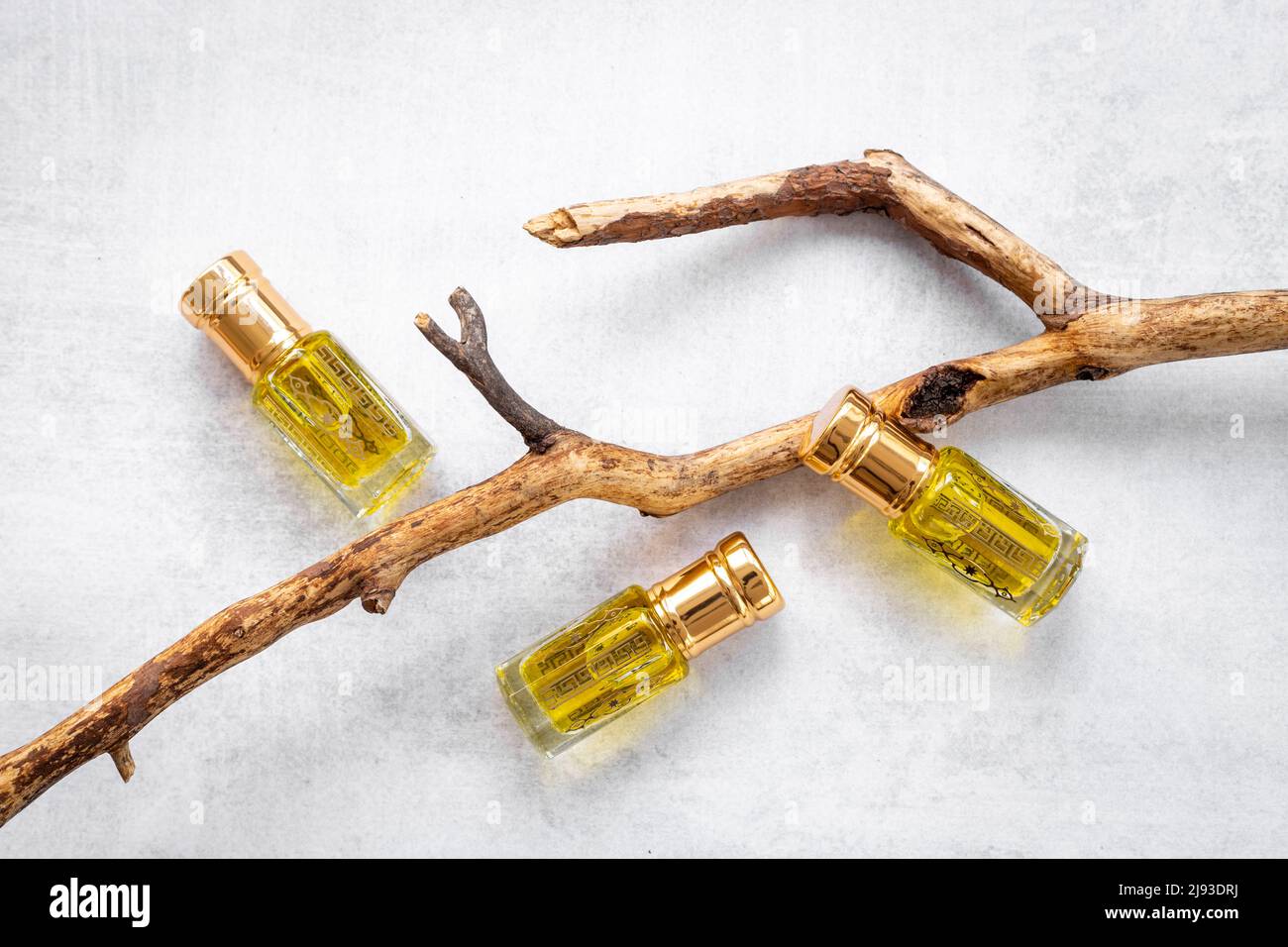 Arabian oud attar oil perfume in glass bottles. Overhead view Stock