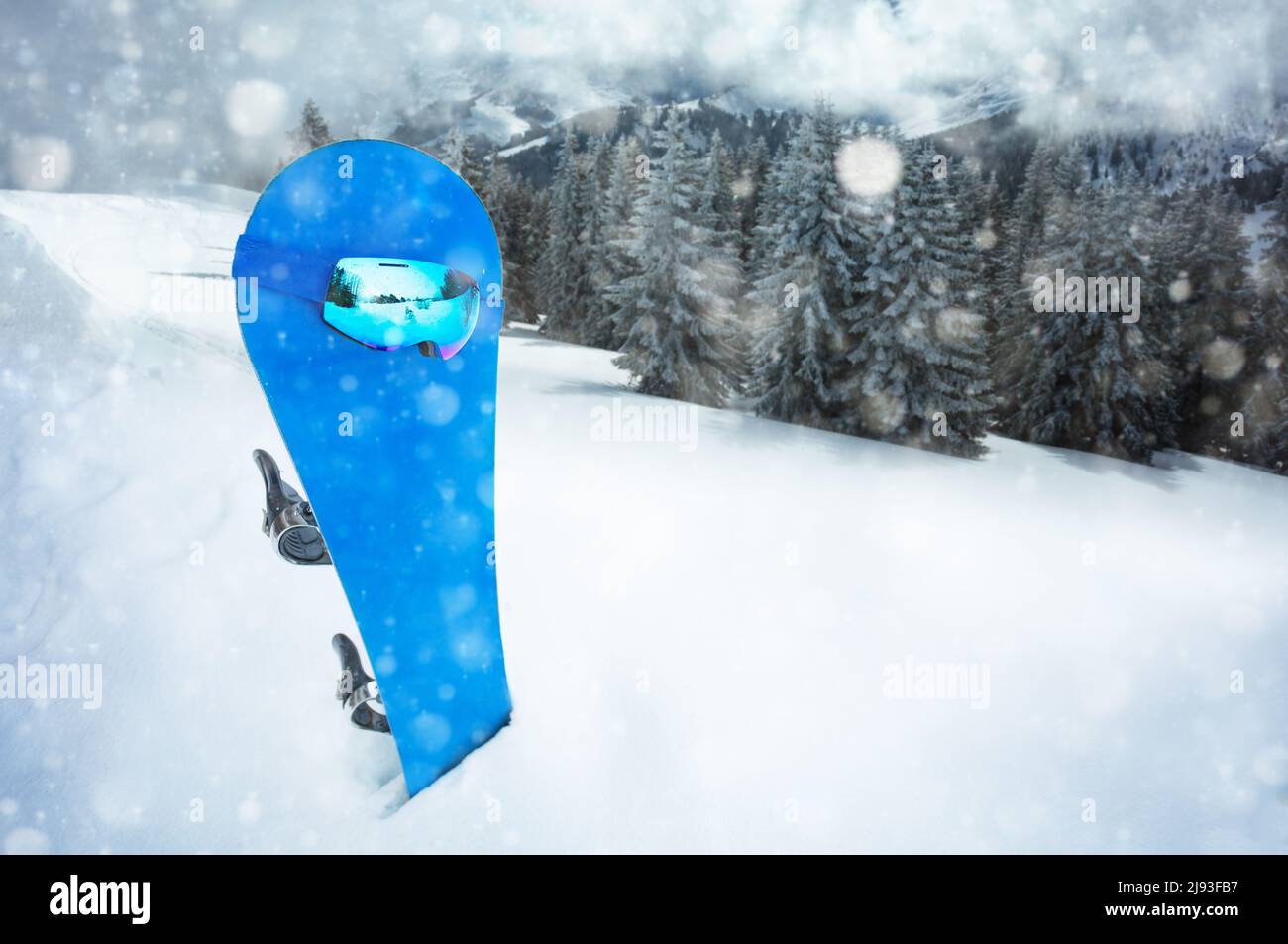 Ski sport mask on the blue snowboard over mountain track Stock Photo