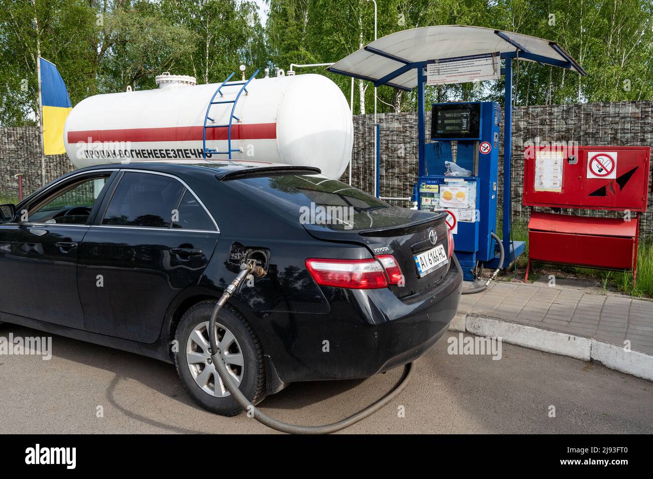 Car filling up with propane at a petrol station. (Photo by Michael