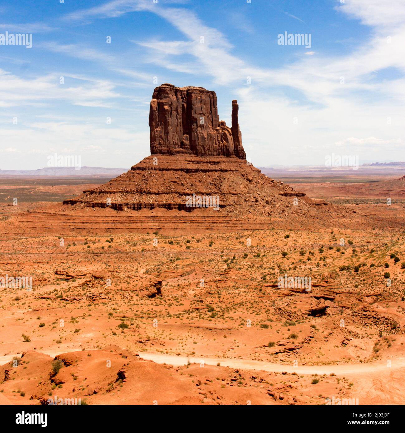 Monument Valley view in Utah and Arizona America. View of the Rock formation West Mitten Butte. High Resolution in Poster format. Stock Photo