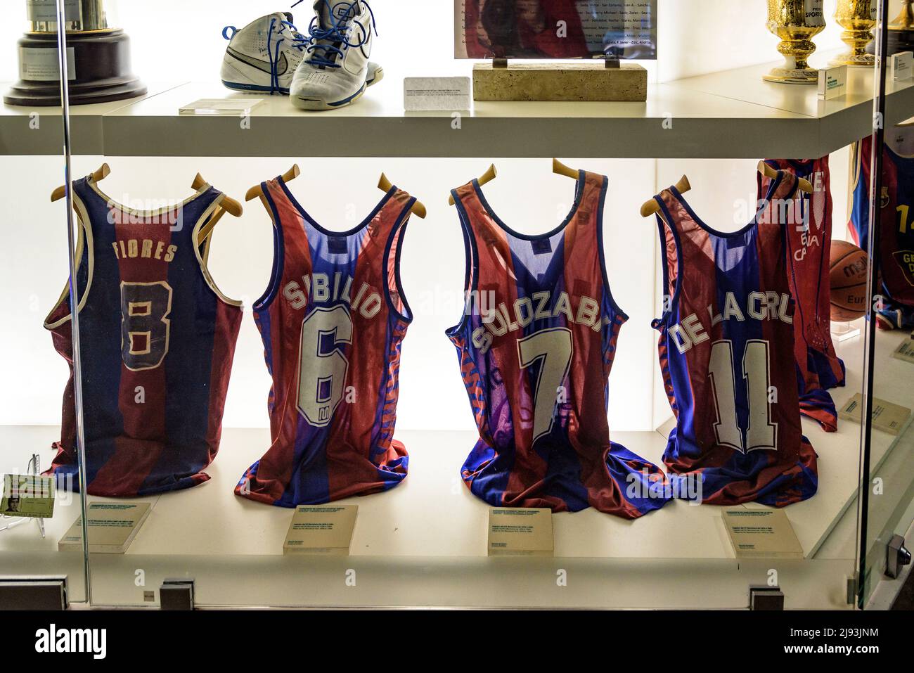 FC Barcelona Museum, in the Camp Nou stadium. Basketball players jerseys (Barcelona, Catalonia, Spain)  ESP: Museo del FC Barcelona, en el Camp Nou Stock Photo