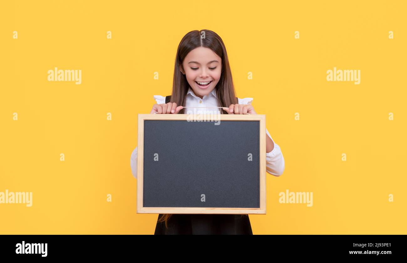 surprised kid presenting novelty information. childhood education Stock